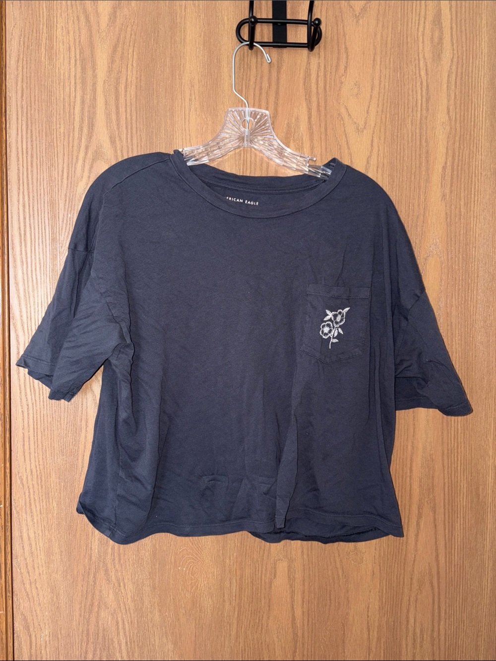 American Eagle Navy Pocket Tee with White Floral Stitch